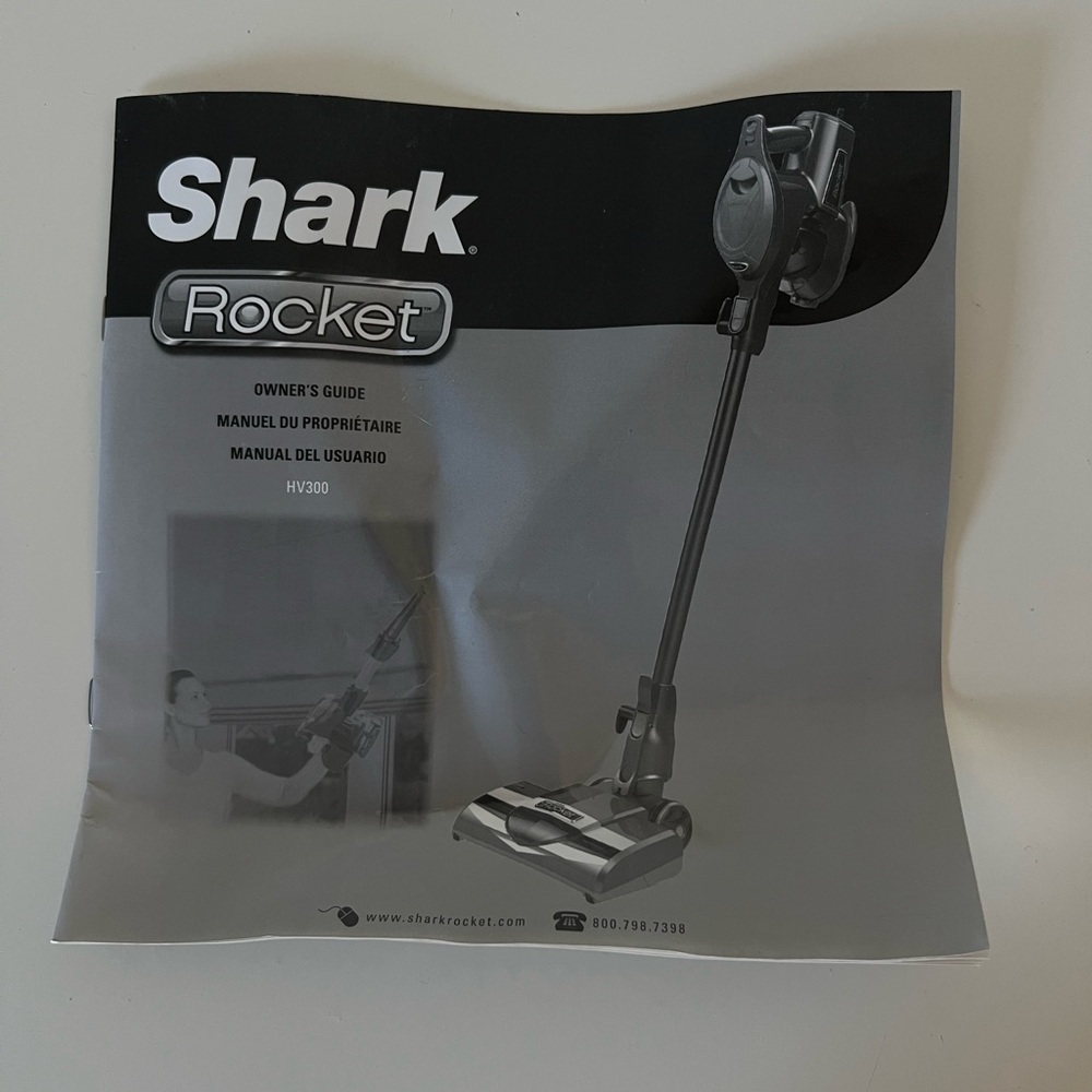 Shark Rocket HV300. Vacuum  Owners Guide Manual